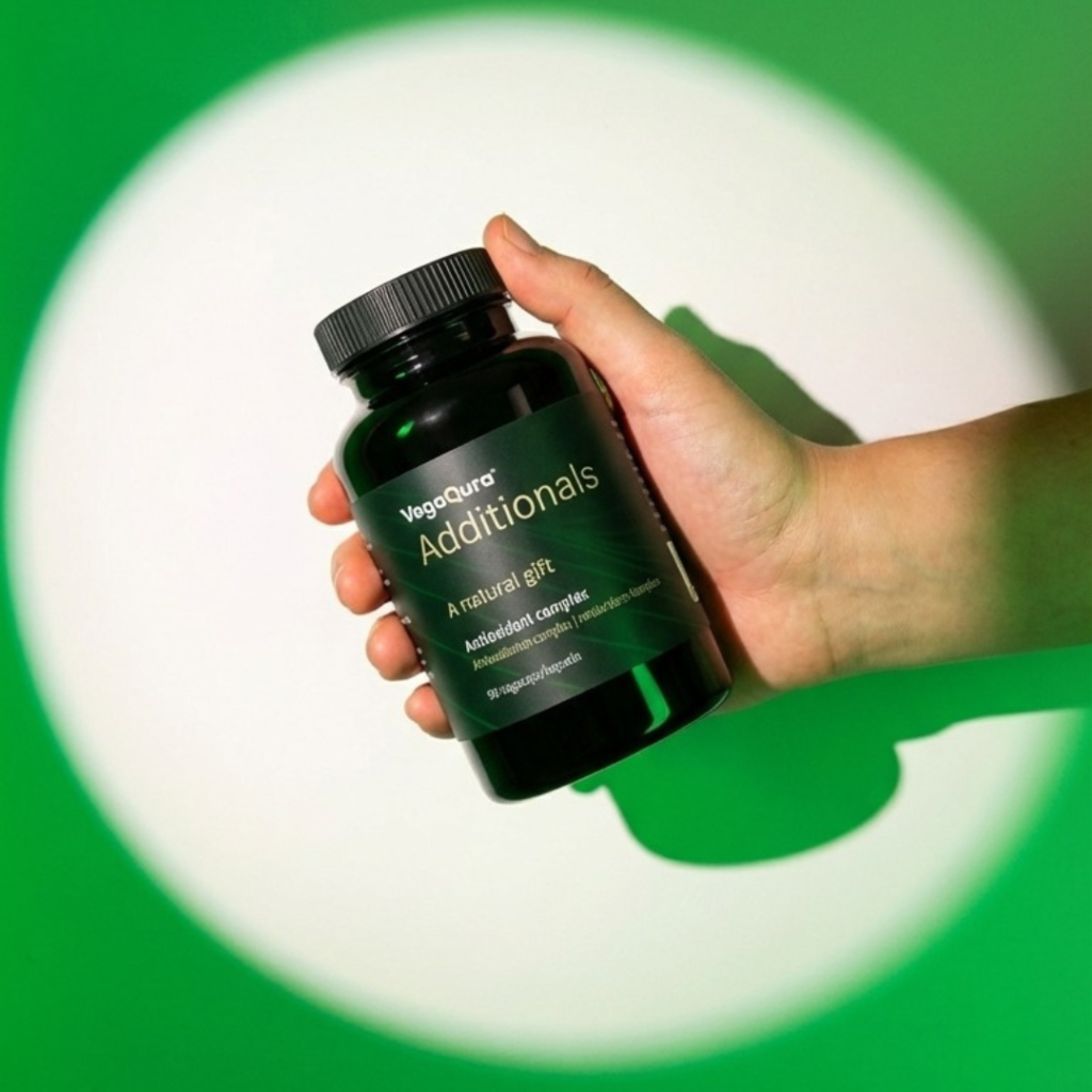 Hand holding probiotic product box